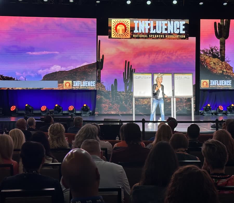 Amanda Gore, leadership keynote speaker, speaking on the main stage at the National Speakers Association Influence conference